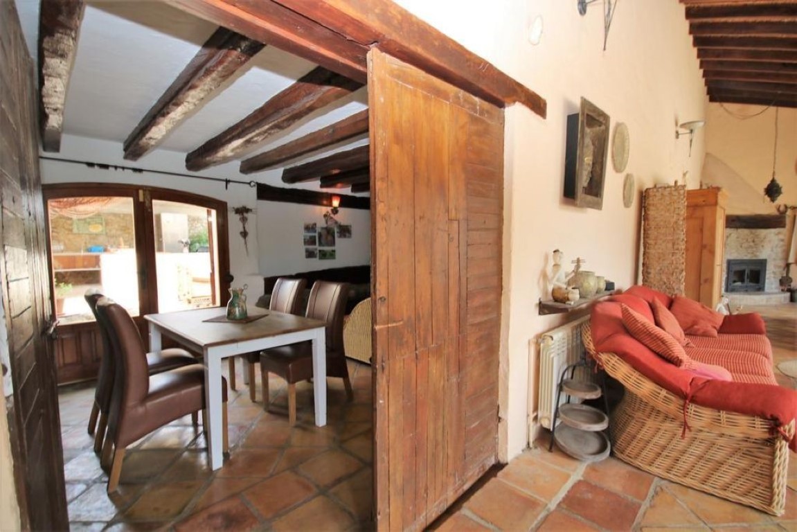 This authentic Spanish finca is located near the center of Jalon, surrounded by the