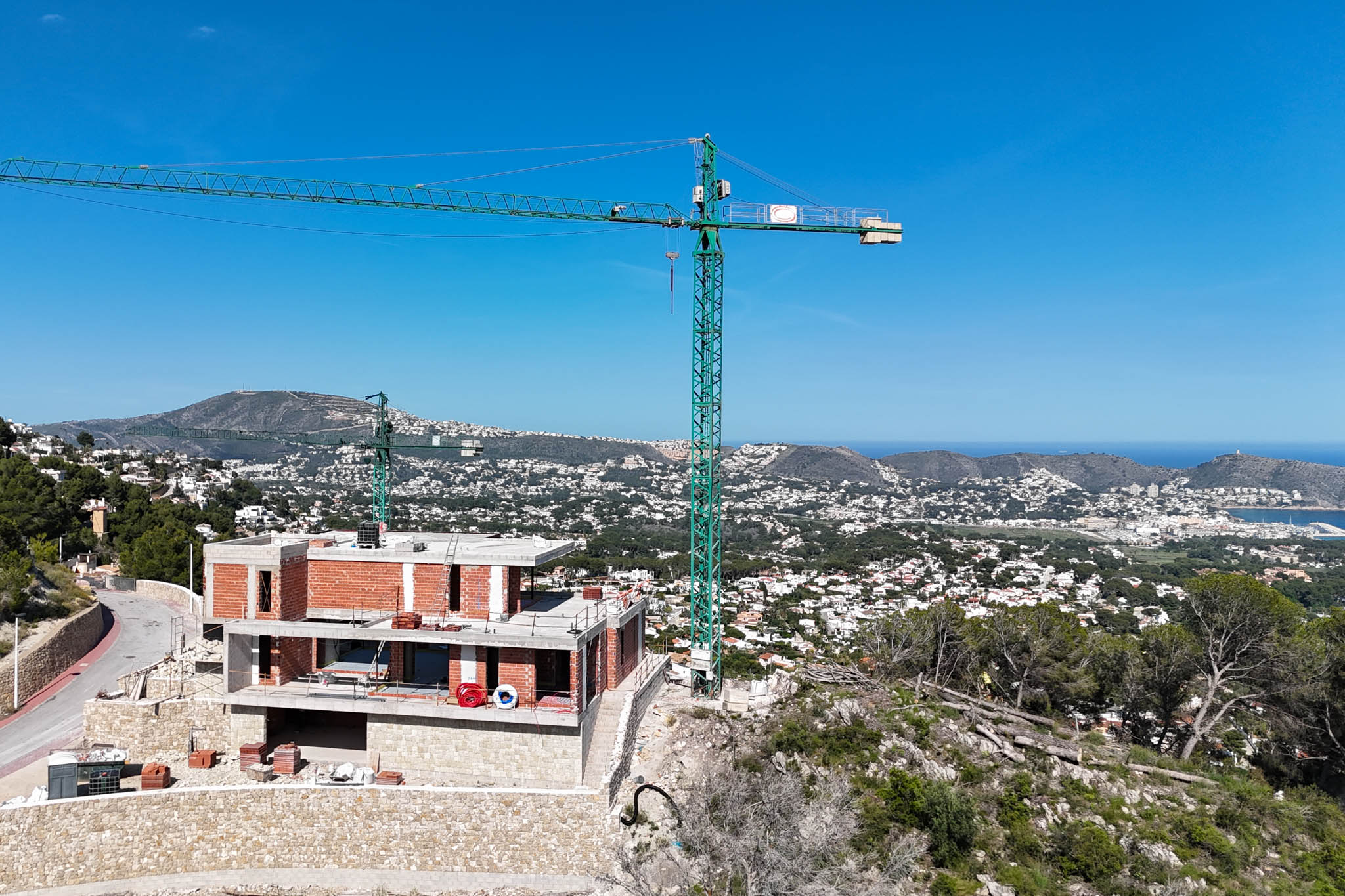 8300MOR Villa moderna en construcción con vistas panorámicas al mar a al venta en Moraira.