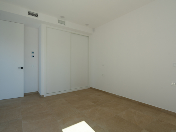 4644BEN New-build villa with sea view on a flat plot of 1715 m2 for sale in La Fustera, Benissa