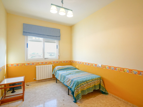 9008XAR Three-story semi-detached house for sale in La Xara.
