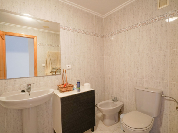 9008XAR Three-story semi-detached house for sale in La Xara.