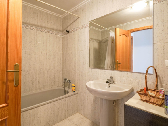 9008XAR Three-story semi-detached house for sale in La Xara.