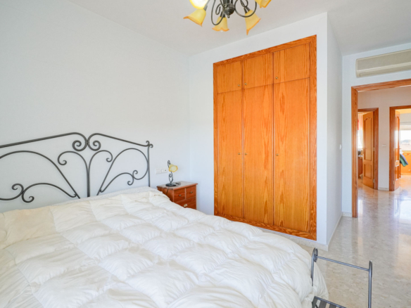 9008XAR Three-story semi-detached house for sale in La Xara.