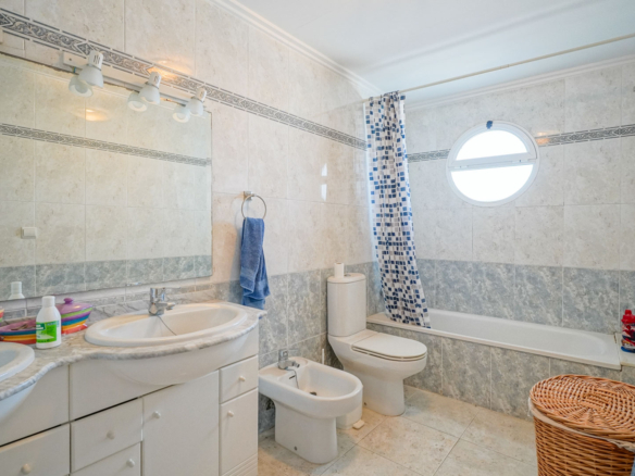 9008XAR Three-story semi-detached house for sale in La Xara.