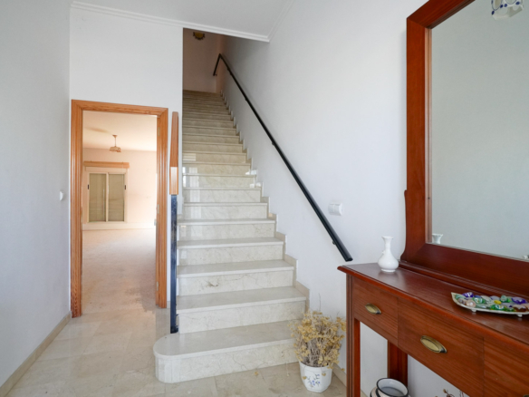 9008XAR Three-story semi-detached house for sale in La Xara.
