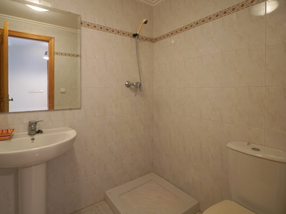 9008XAR Three-story semi-detached house for sale in La Xara.