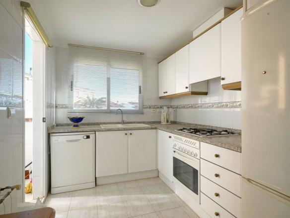 9008XAR Three-story semi-detached house for sale in La Xara.