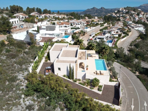 OFF7120PED Nieuwbouwwilla in Ibiza-stijl met panoramisch uitzicht op de bergen, te koop in Pedreguer